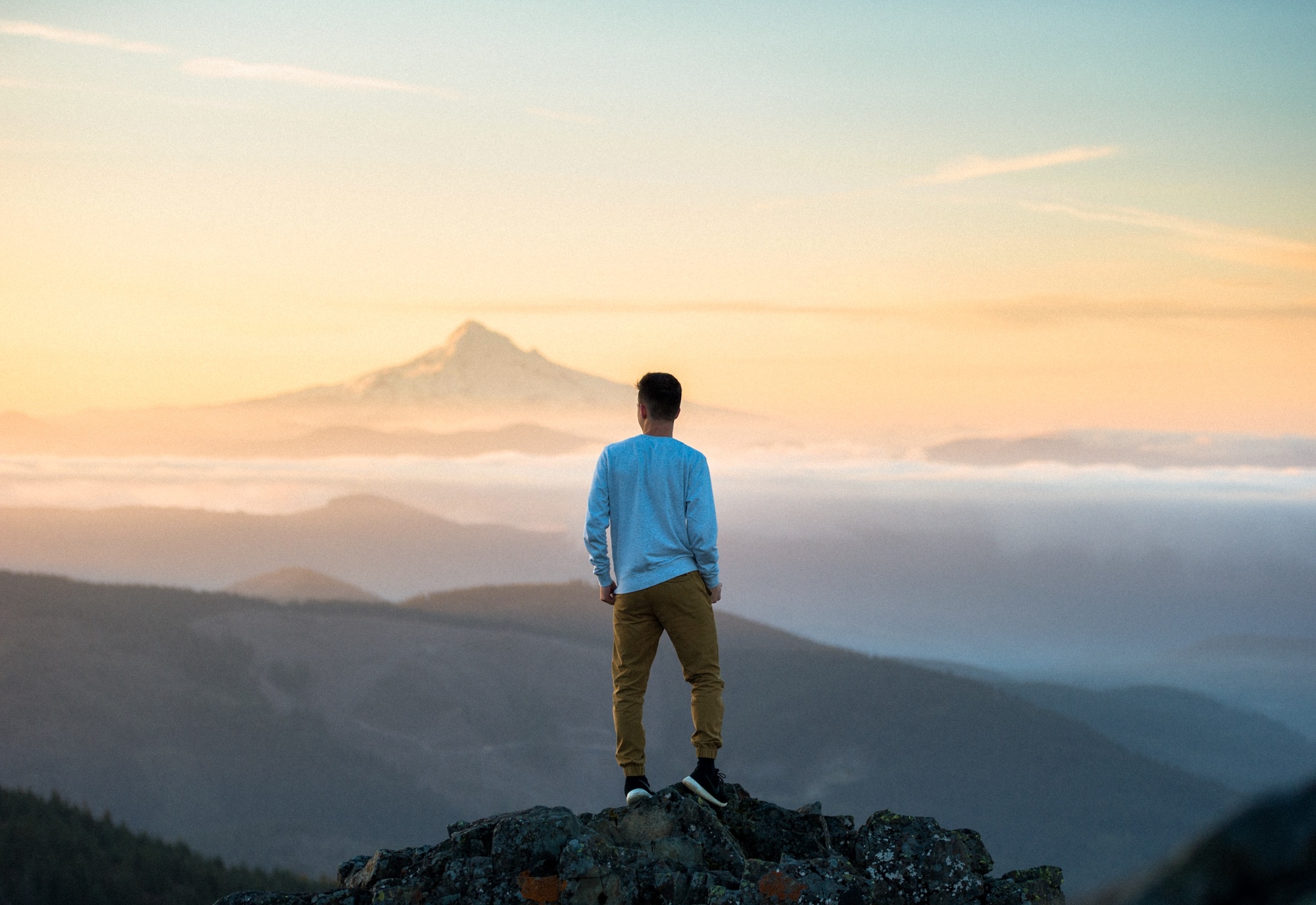 person between mountains